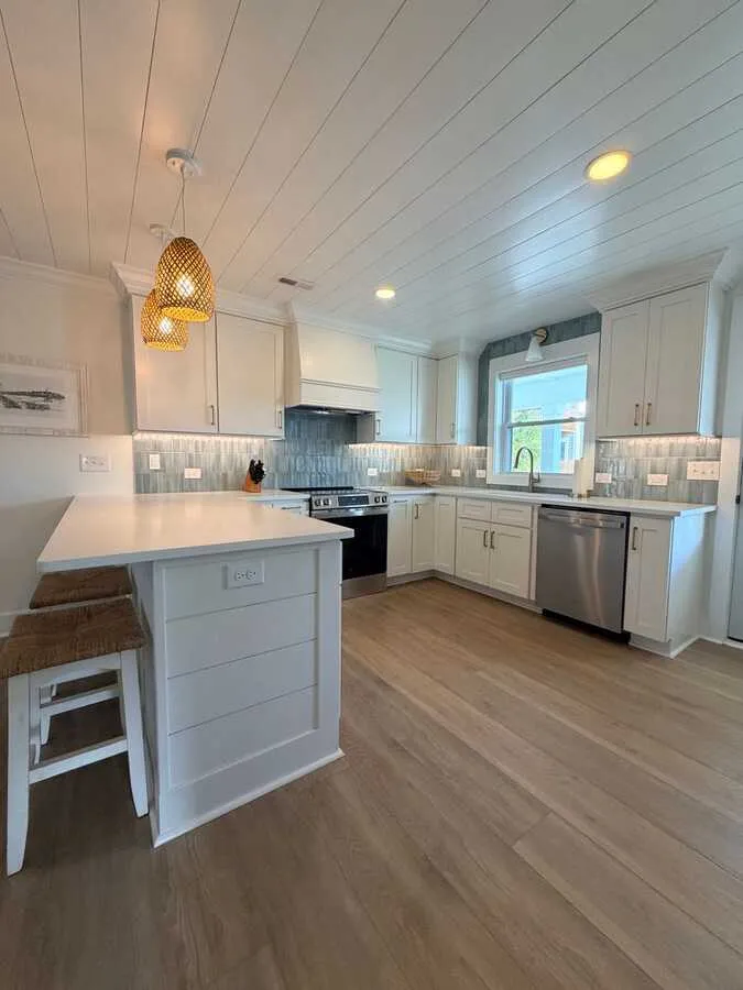 Kitchen island with shiplap ceiling